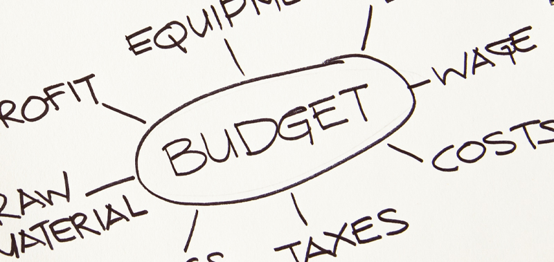 Image of a paper listing out items in a budget, showcasing detailed financial planning and budget allocation.